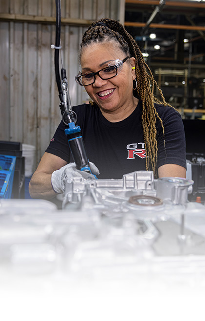 Happy Nissan assembly line worker