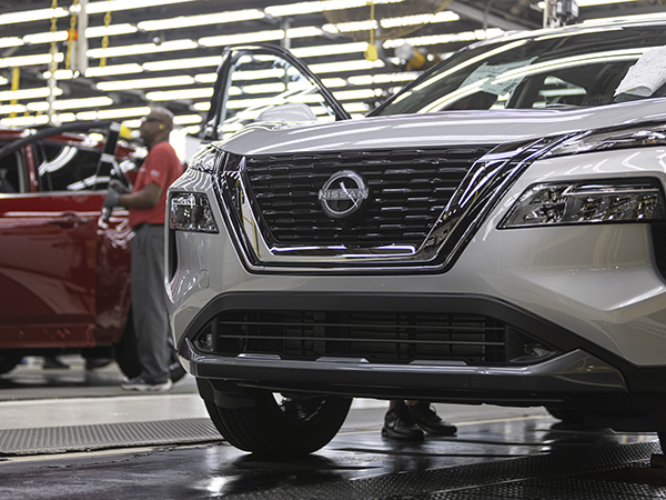 Nissan Rogue on display within assembly plant